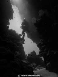 Diver entering a cave.  Shot witht he old oly 5060 by Adam Skrzypczyk 